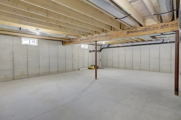 a view of a room with wooden walls