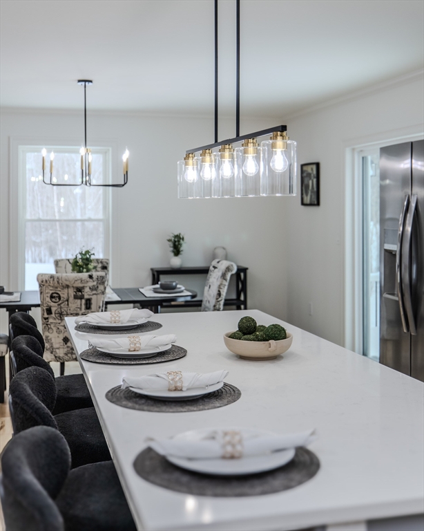 6 Winslow Road Ware, MA 01082 - Photo 4 of 34 a dining room with furniture and chandelier