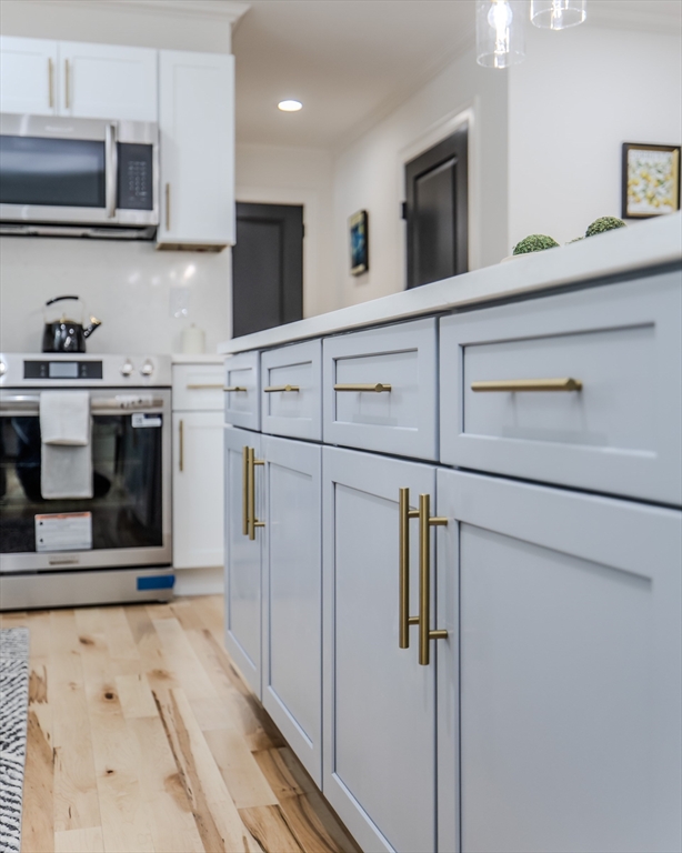 6 Winslow Road Ware, MA 01082 - Photo 5 of 34 a kitchen with stainless steel appliances granite countertop a refrigerator and a stove top oven