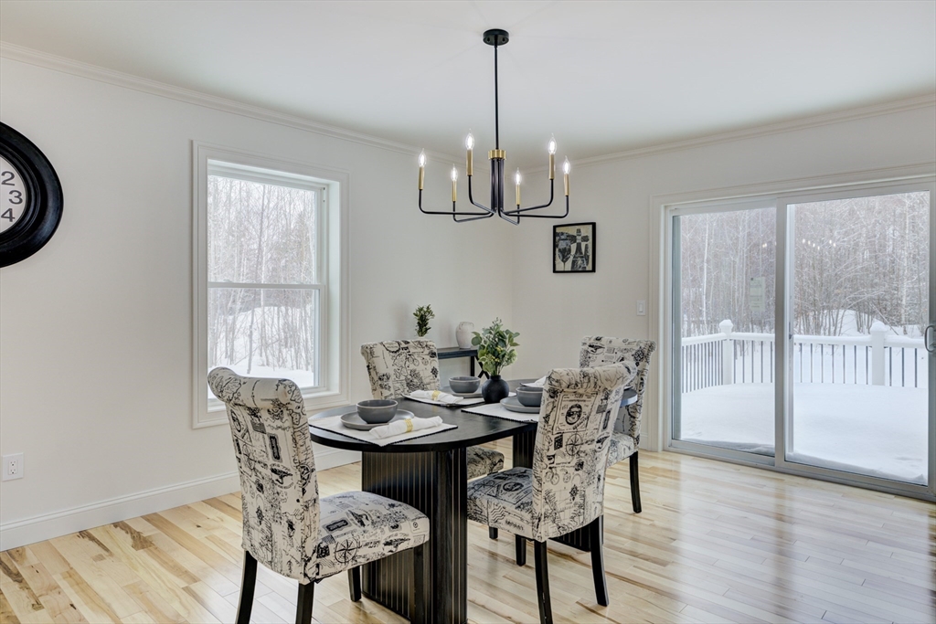 6 Winslow Road Ware, MA 01082 - Photo 8 of 34 a view of a dining room with furniture window and wooden floor