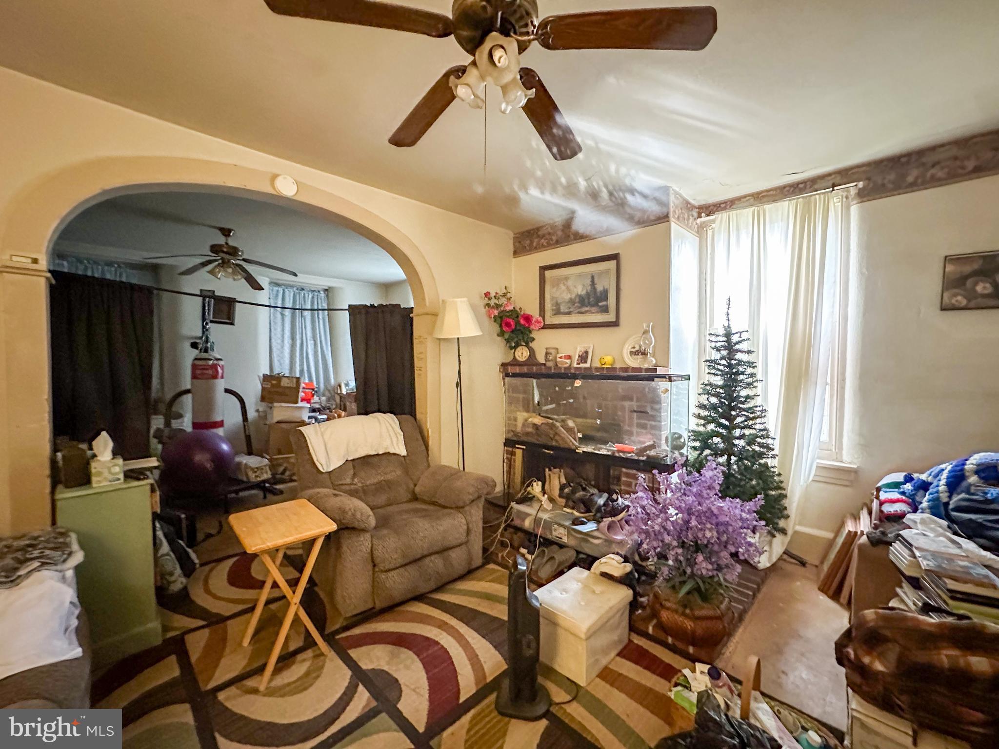 580 Elkdale Road Lincoln University, PA 19352 - Photo 20 of 42 a living room with patio furniture and a chandelier