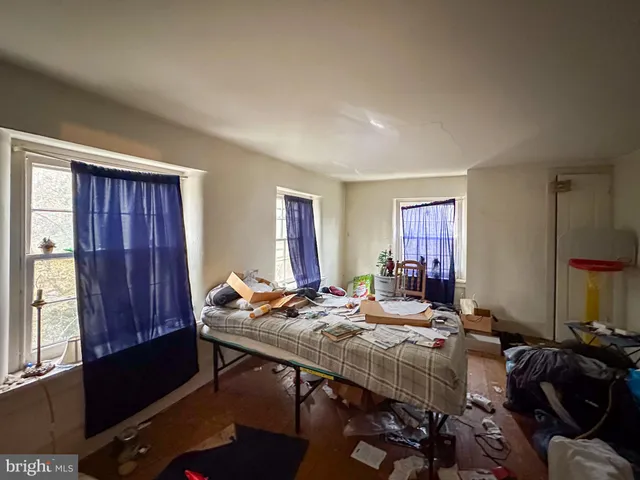 a view of a livingroom with furniture and window