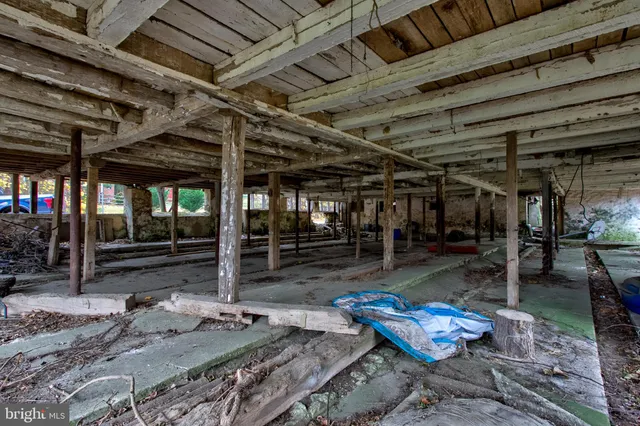 a view of a storage room with wooden floor