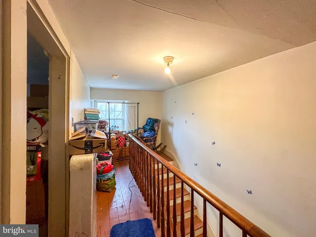 a view of a hallway with workspace