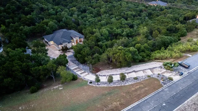 a view of a backyard of the house