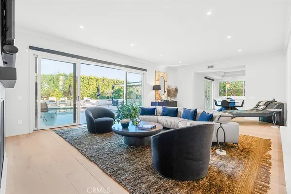 a kitchen with a table and chairs in it