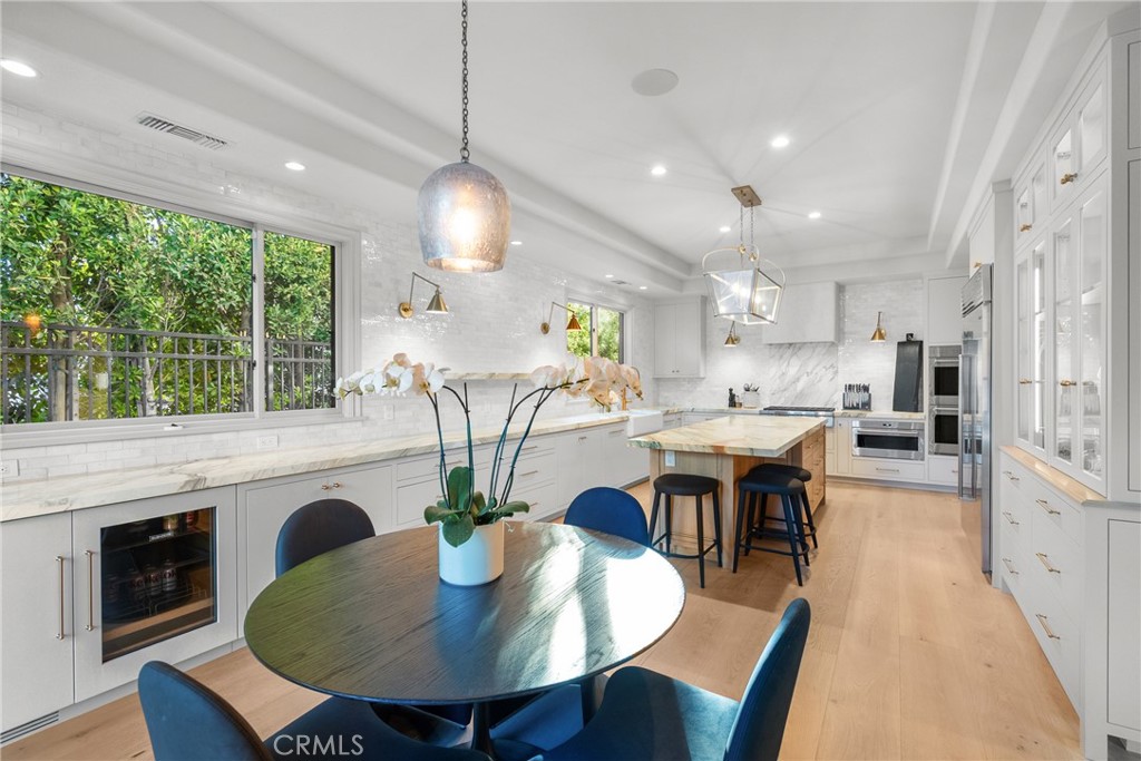 23477 Park Colombo Calabasas, CA 91302 - Photo 15 of 56 a view of a dining room with furniture window and outside view