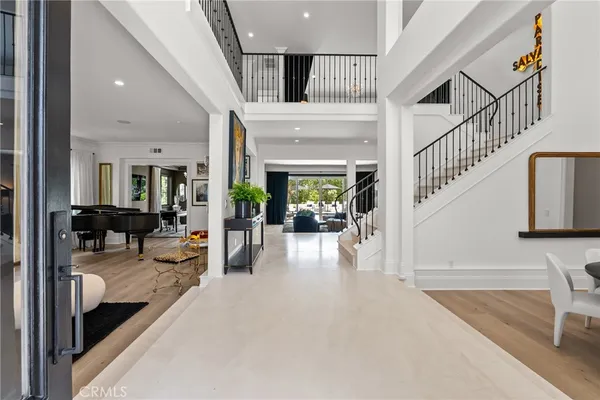 a view of livingroom with dining room and furniture