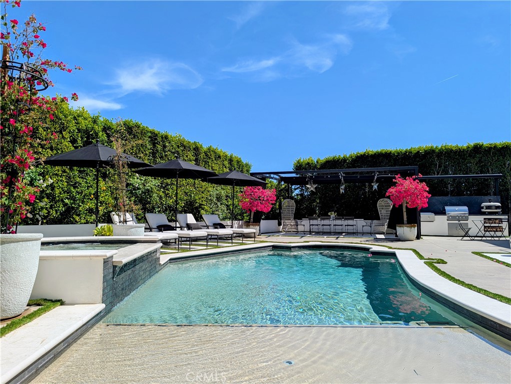 23477 Park Colombo Calabasas, CA 91302 - Photo 49 of 54 a view of a swimming pool with a patio