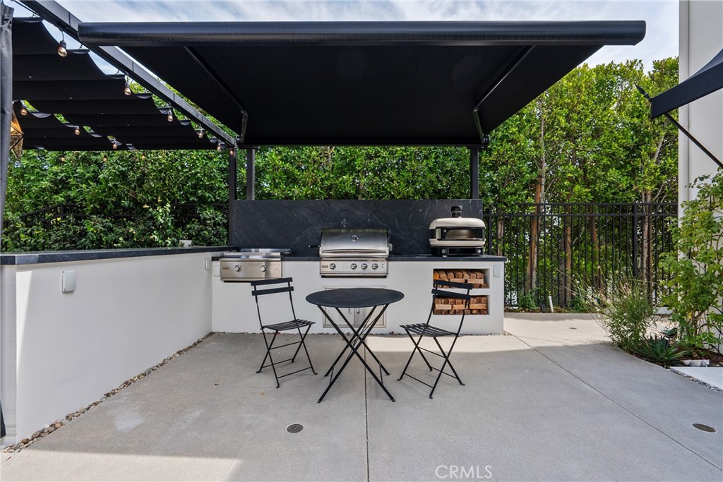 23477 Park Colombo Calabasas, CA 91302 - Photo 50 of 56 a view of an outdoor space with seating