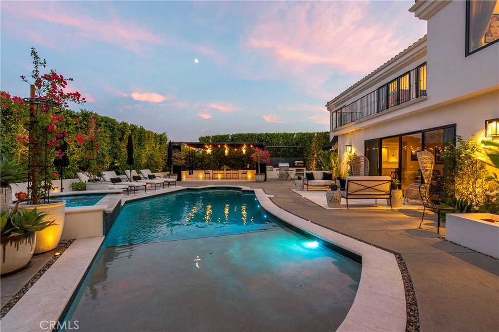 23477 Park Colombo Calabasas, CA 91302 - Photo 51 of 56 a view of a swimming pool with a patio