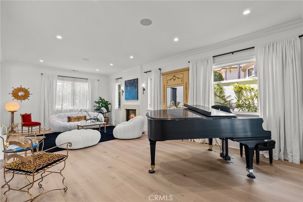 23477 Park Colombo Calabasas, CA 91302 - Photo 8 of 56 a living room with furniture a window and a table