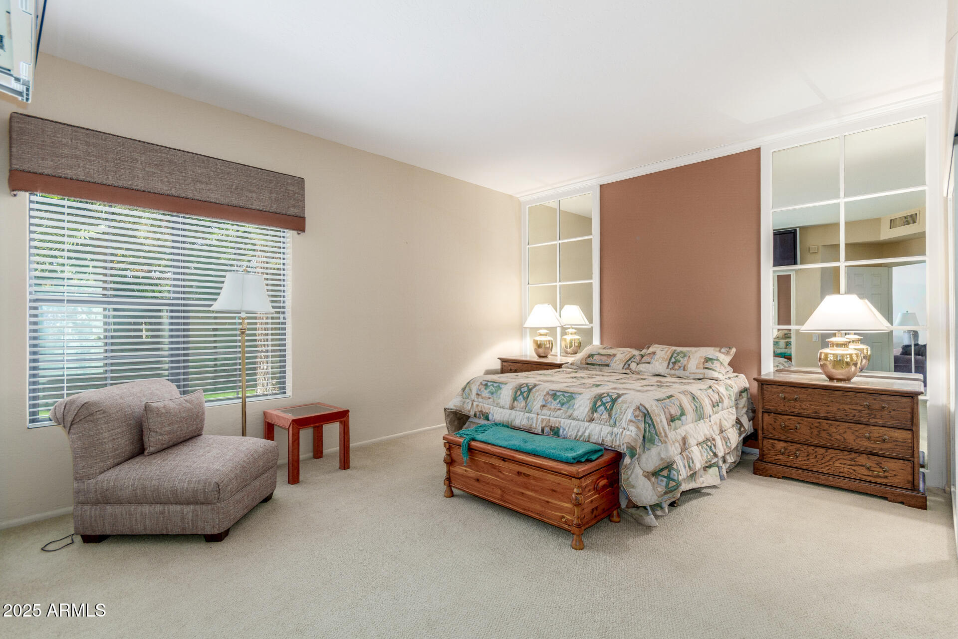 10019 East Mountain View Road, Unit 1121 Scottsdale, AZ 85258 - Photo 13 of 39 a bedroom with bed and a couch