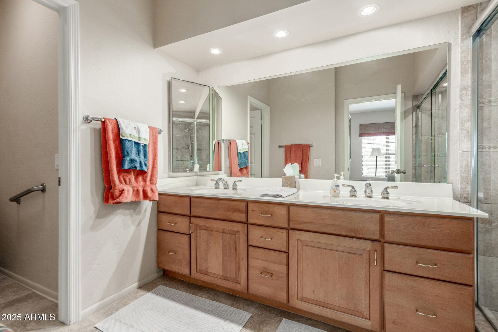 10019 East Mountain View Road, Unit 1121 Scottsdale, AZ 85258 - Photo 15 of 39 a bathroom with a double vanity sink and a mirror