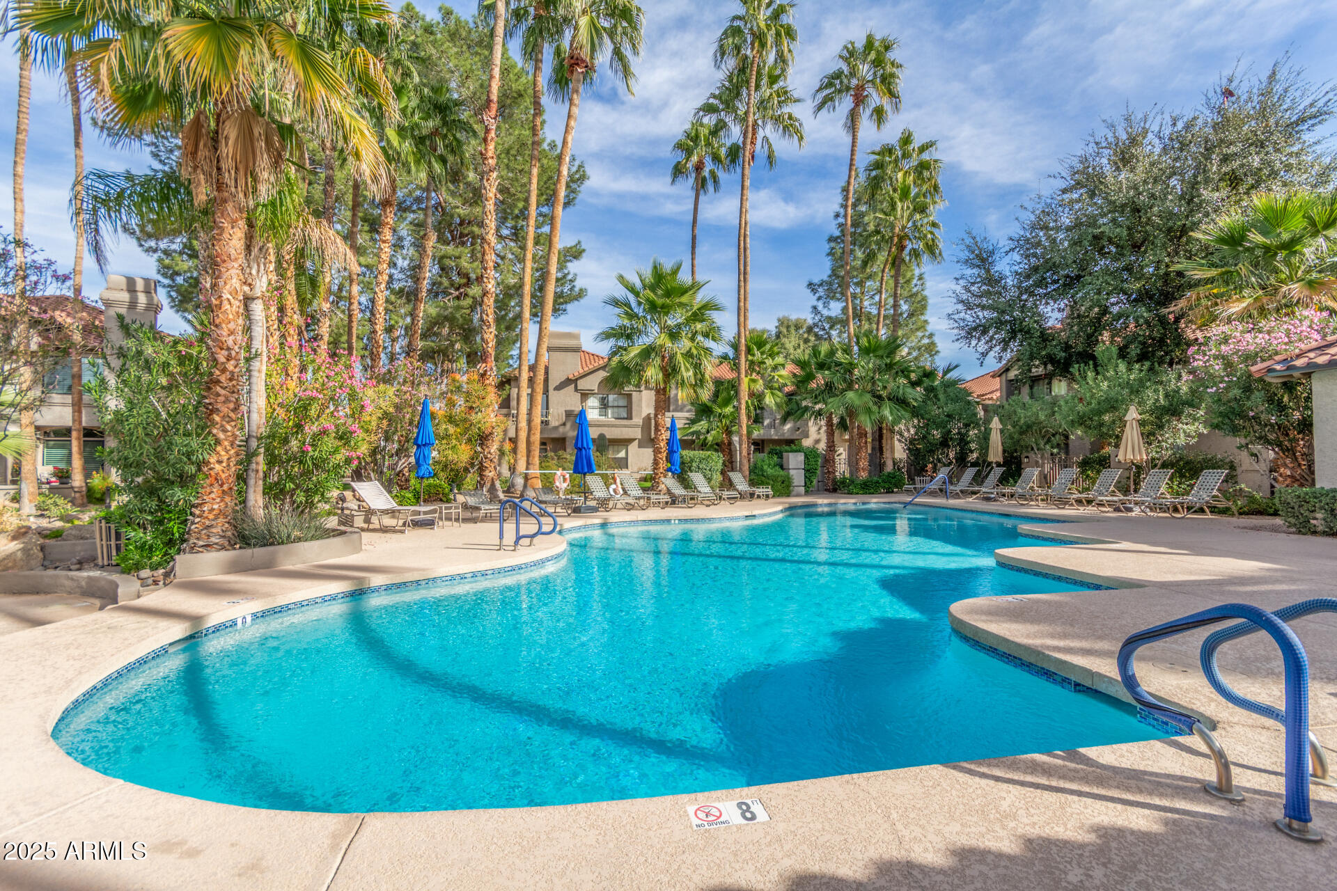 10019 East Mountain View Road, Unit 1121 Scottsdale, AZ 85258 - Photo 35 of 39 a view of a swimming pool with a patio