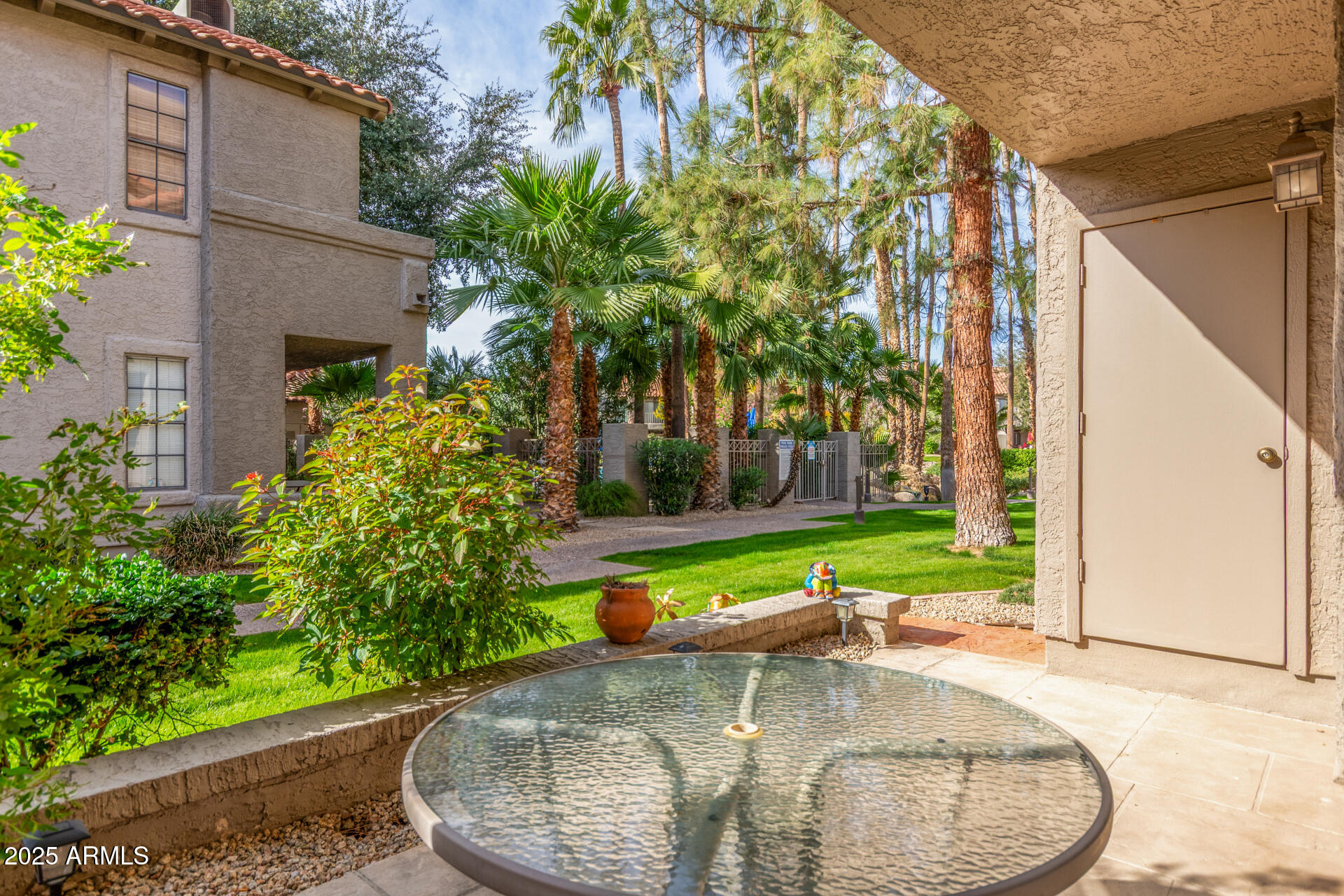 10019 East Mountain View Road, Unit 1121 Scottsdale, AZ 85258 - Photo 6 of 39 a view of a swimming pool with a patio