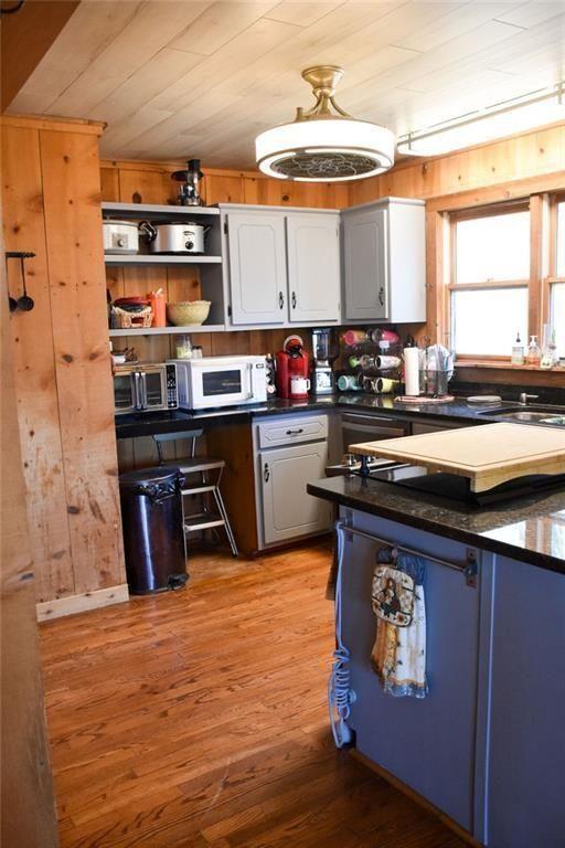 716 Moss Patch Trail Jasper, GA 30143 - Photo 3 of 26 a kitchen with stainless steel appliances granite countertop a stove and a refrigerator