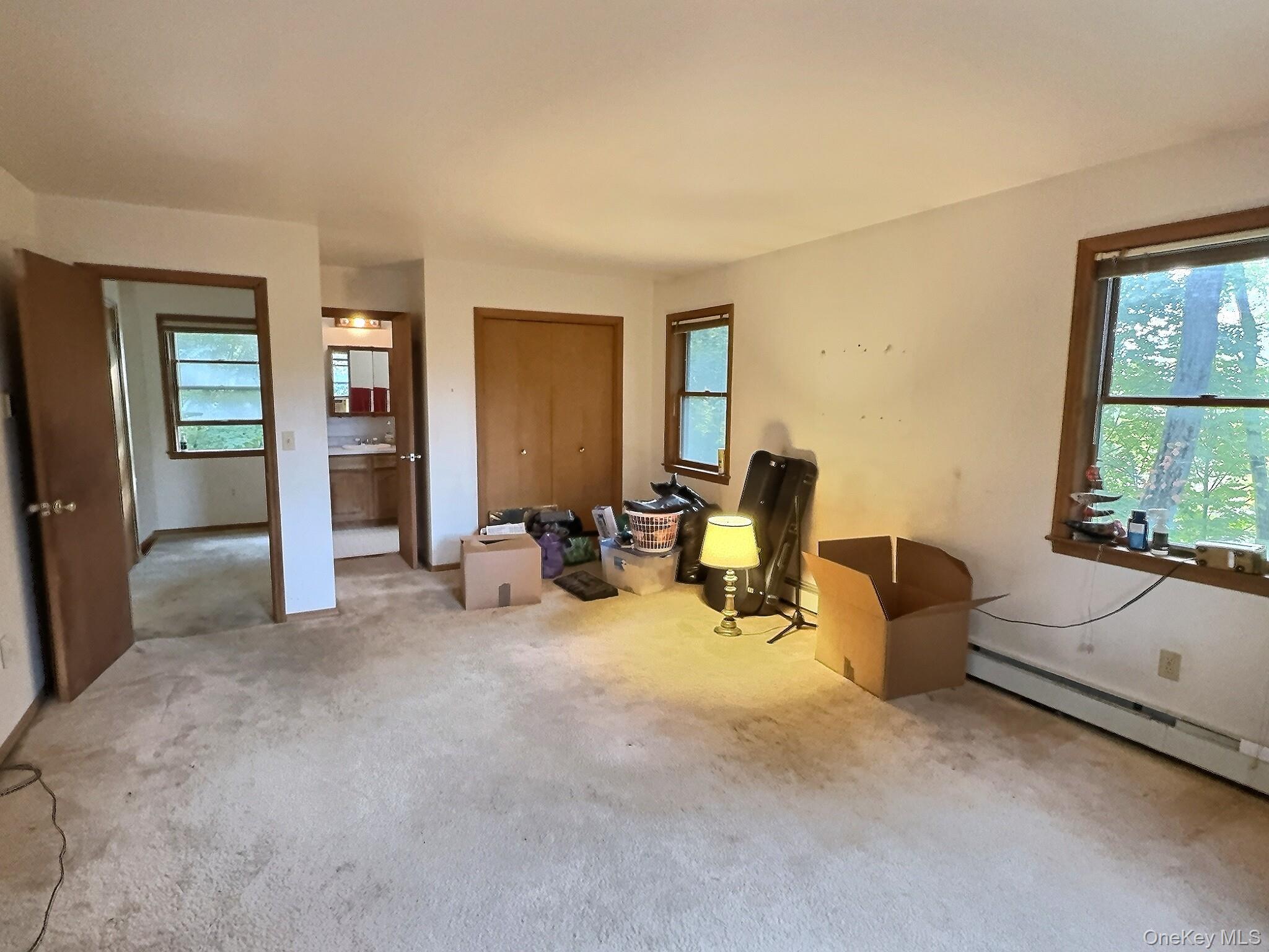 28 Wilson Place Cornwall, NY 12518 - Photo 11 of 24 a view of a livingroom with workspace and a window