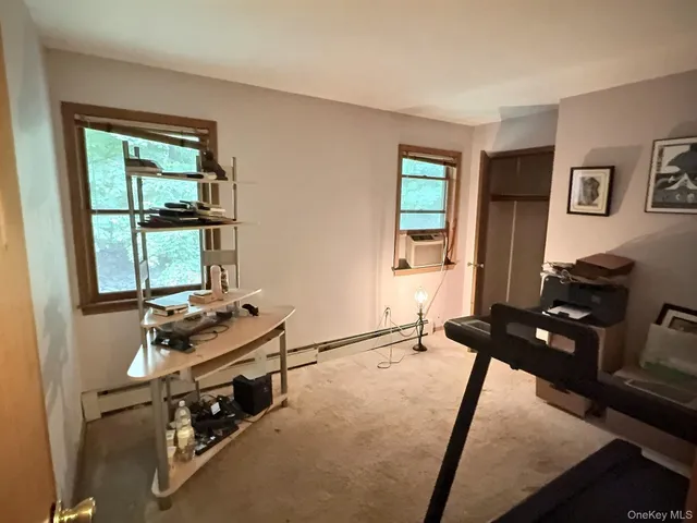 a room with furniture and a window