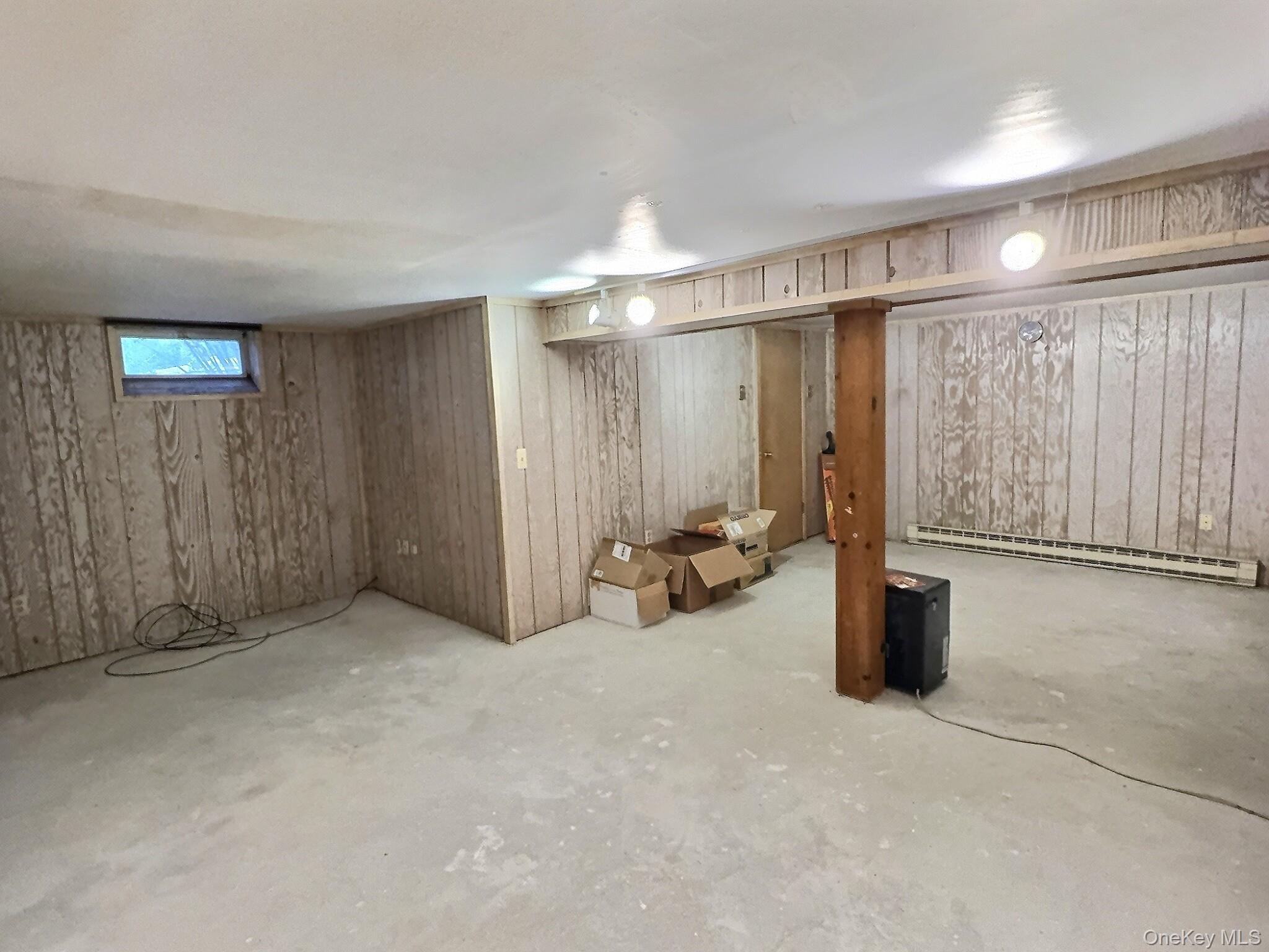 28 Wilson Place Cornwall, NY 12518 - Photo 16 of 24 an empty room with windows and couches