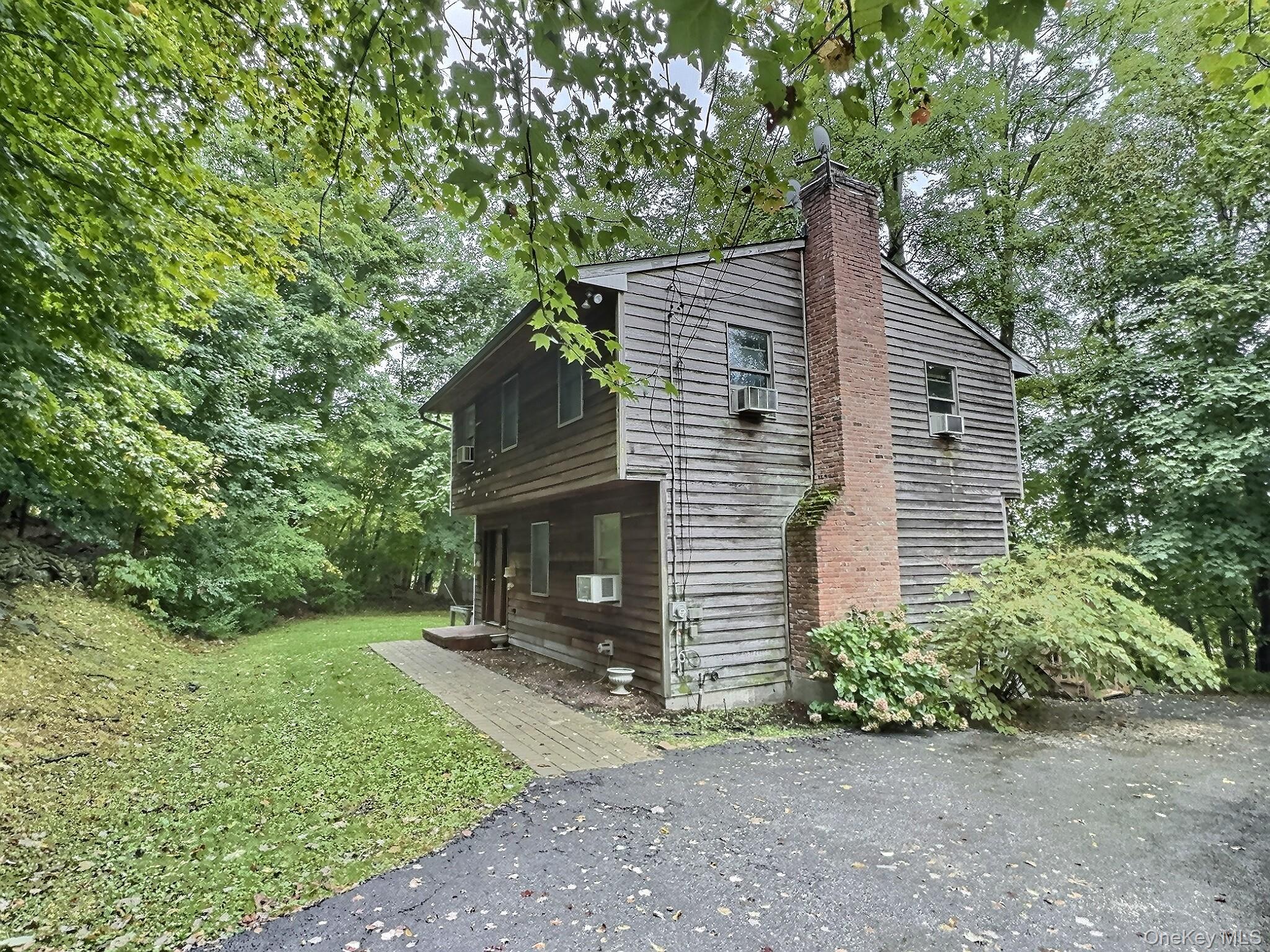 28 Wilson Place Cornwall, NY 12518 - Photo 21 of 24 a view of house with a yard and potted plants