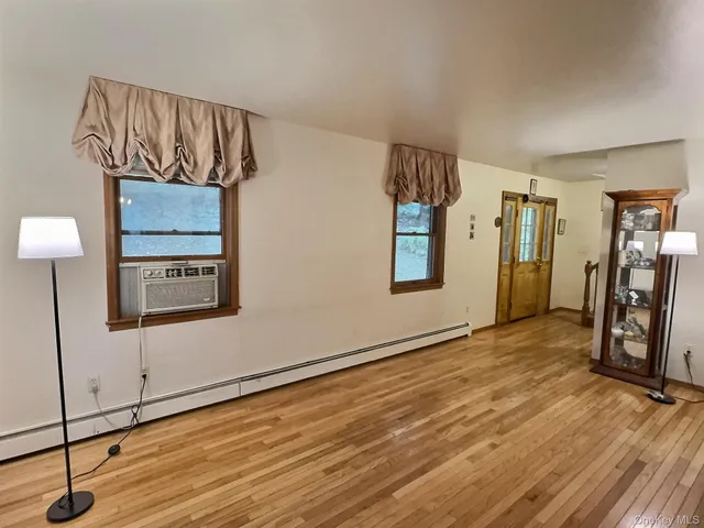 a view of workspace with wooden floor