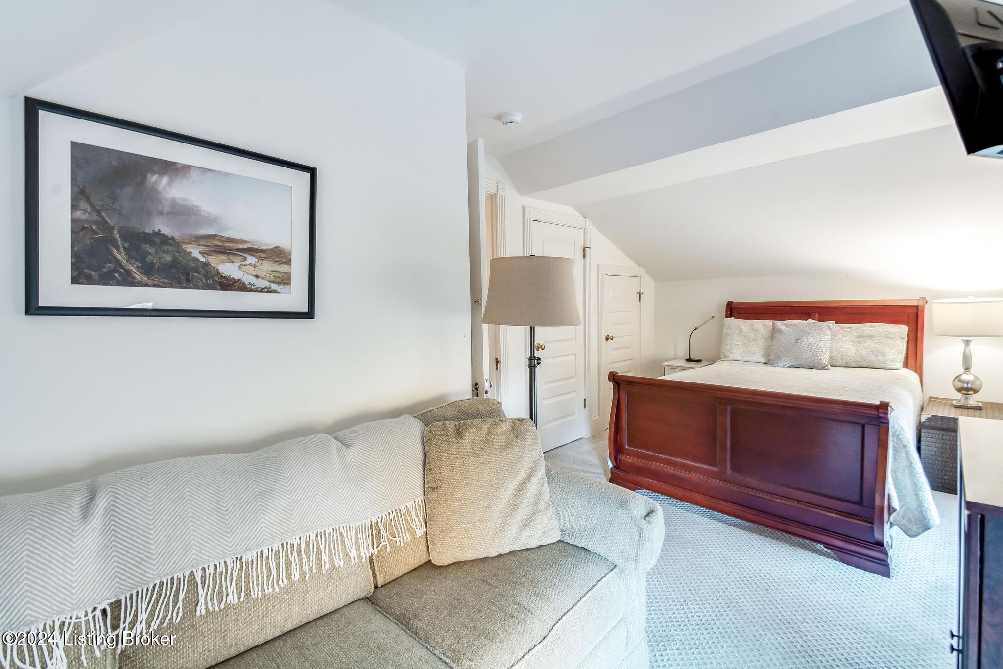 1731 Sulgrave Road Louisville, KY 40205 - Photo 50 of 86 3rd floor bedroom with sofa to remain