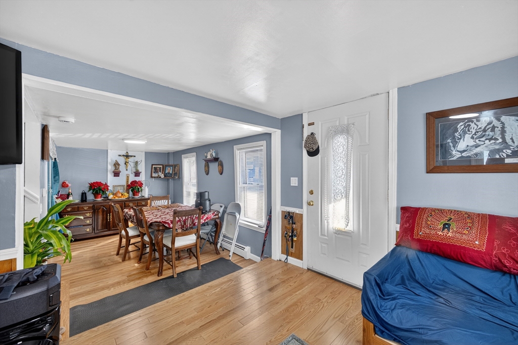 5 South Webster Street Haverhill, MA 01835 - Photo 4 of 15 a living room with furniture and a wooden floor