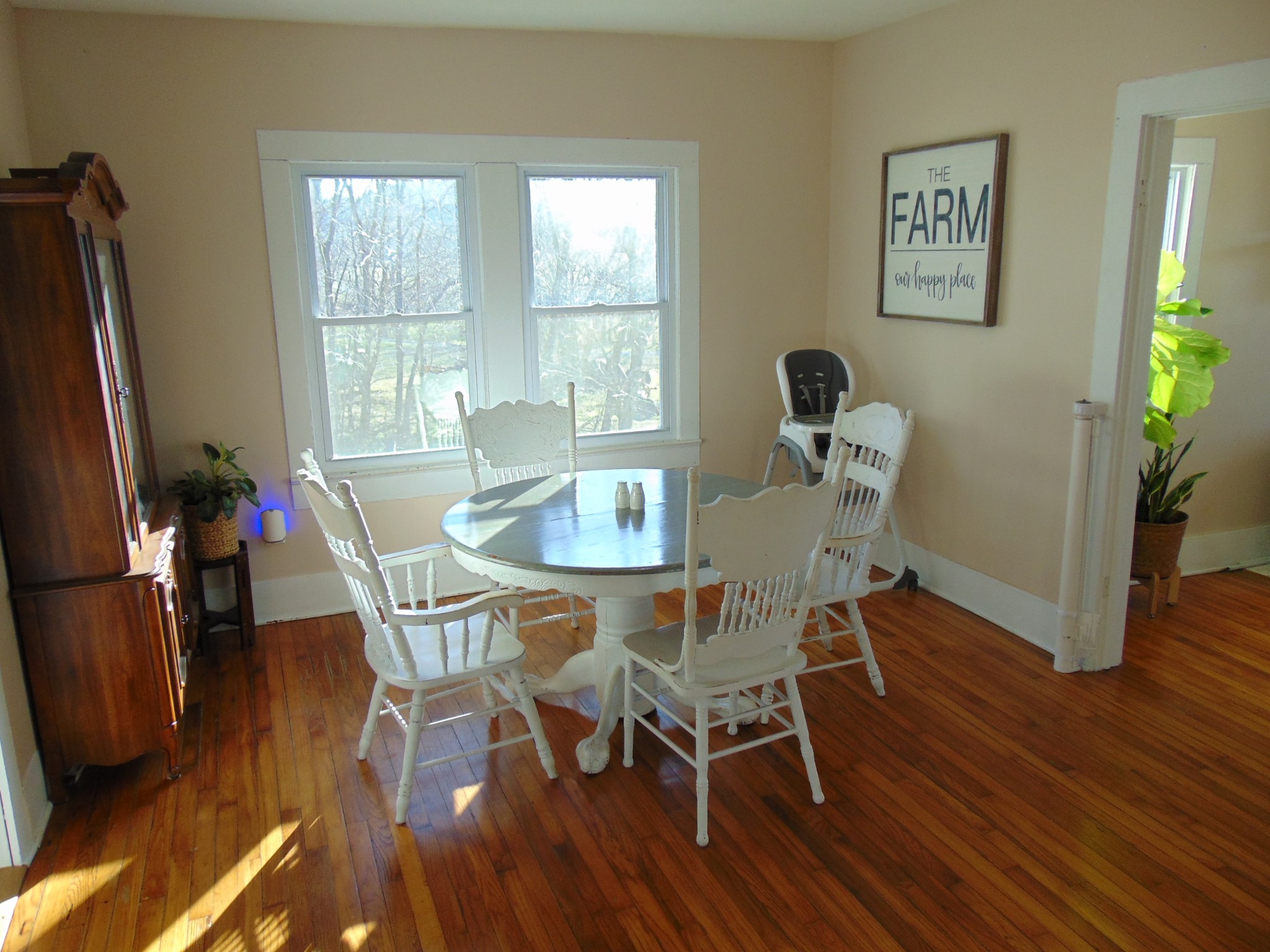 3547 Coffey Branch Road Cornersville, TN 37047 - Photo 11 of 57 a dining room with furniture and wooden floor