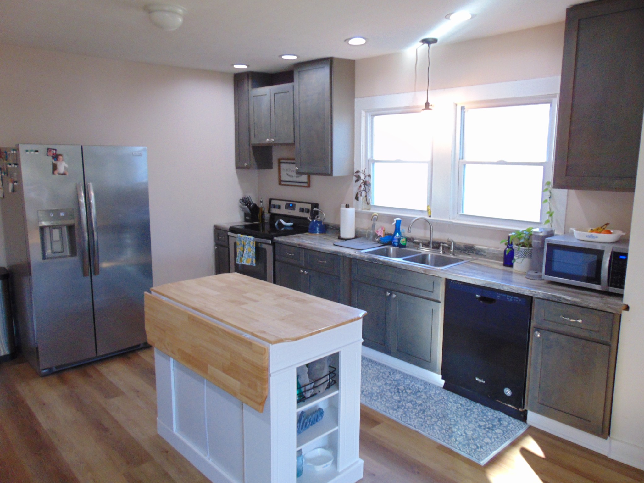3547 Coffey Branch Road Cornersville, TN 37047 - Photo 16 of 57 a kitchen with a sink stove and refrigerator