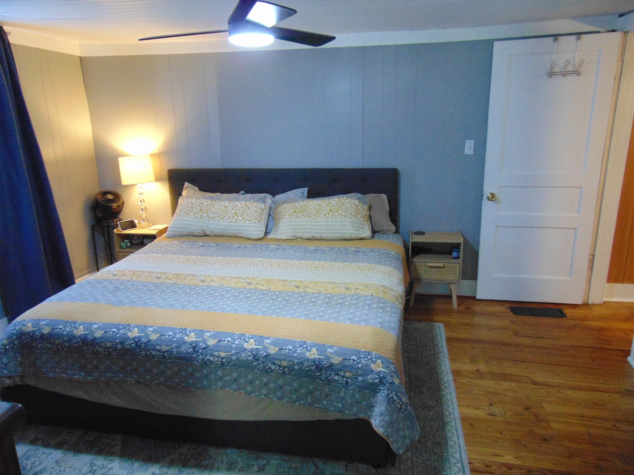 3547 Coffey Branch Road Cornersville, TN 37047 - Photo 25 of 57 a bedroom with a bed and a chandelier