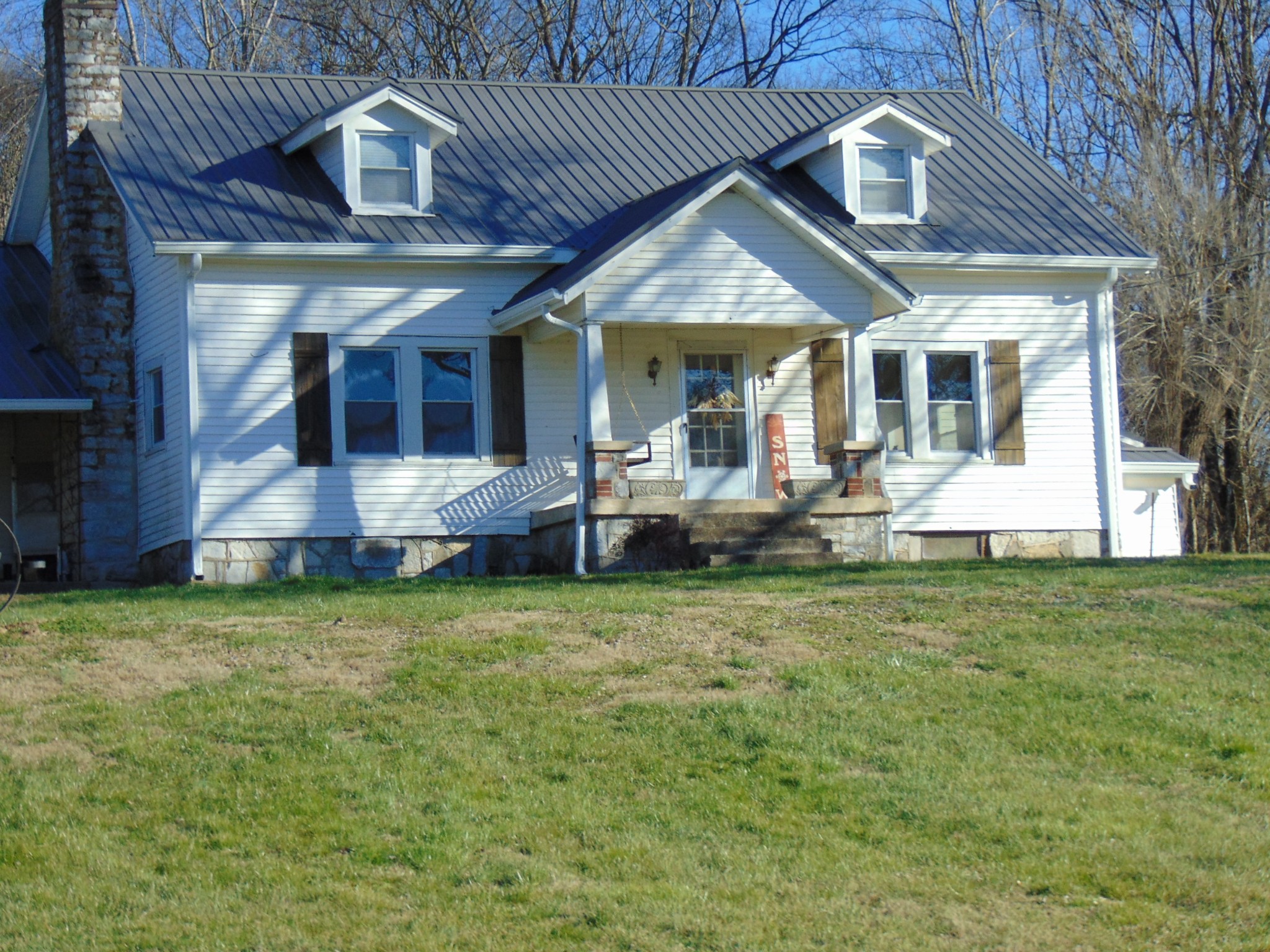 3547 Coffey Branch Road Cornersville, TN 37047 - Photo 32 of 57 a front view of a house with a yard