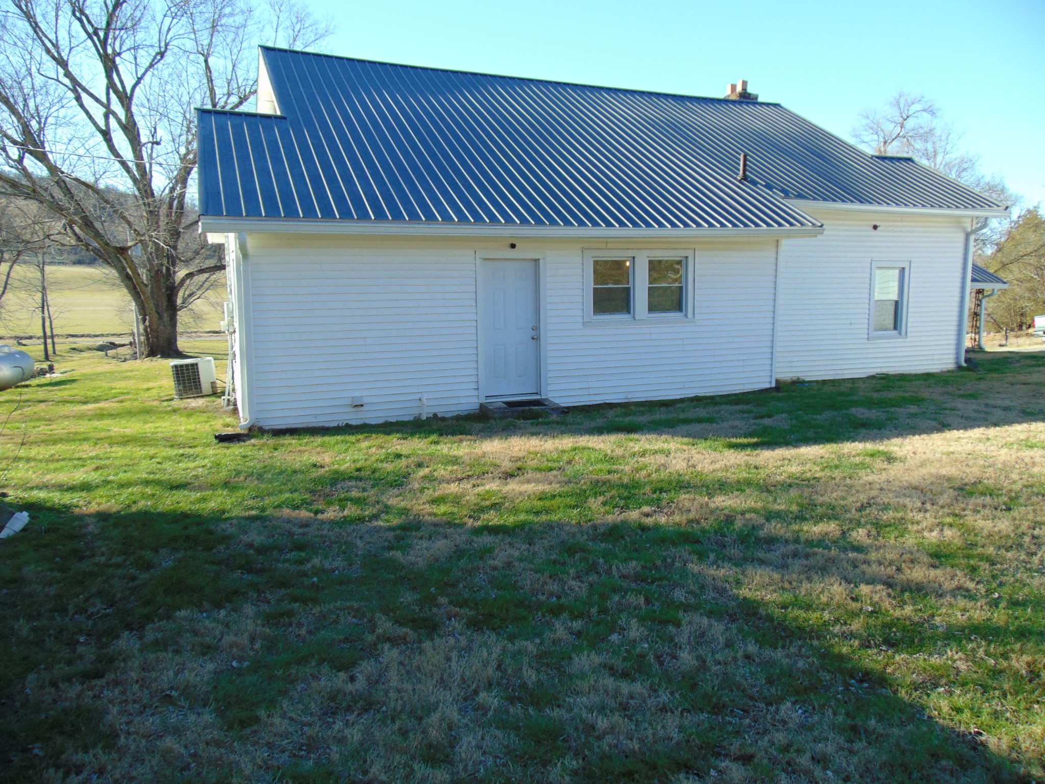 3547 Coffey Branch Road Cornersville, TN 37047 - Photo 34 of 57 a view of a house with a yard