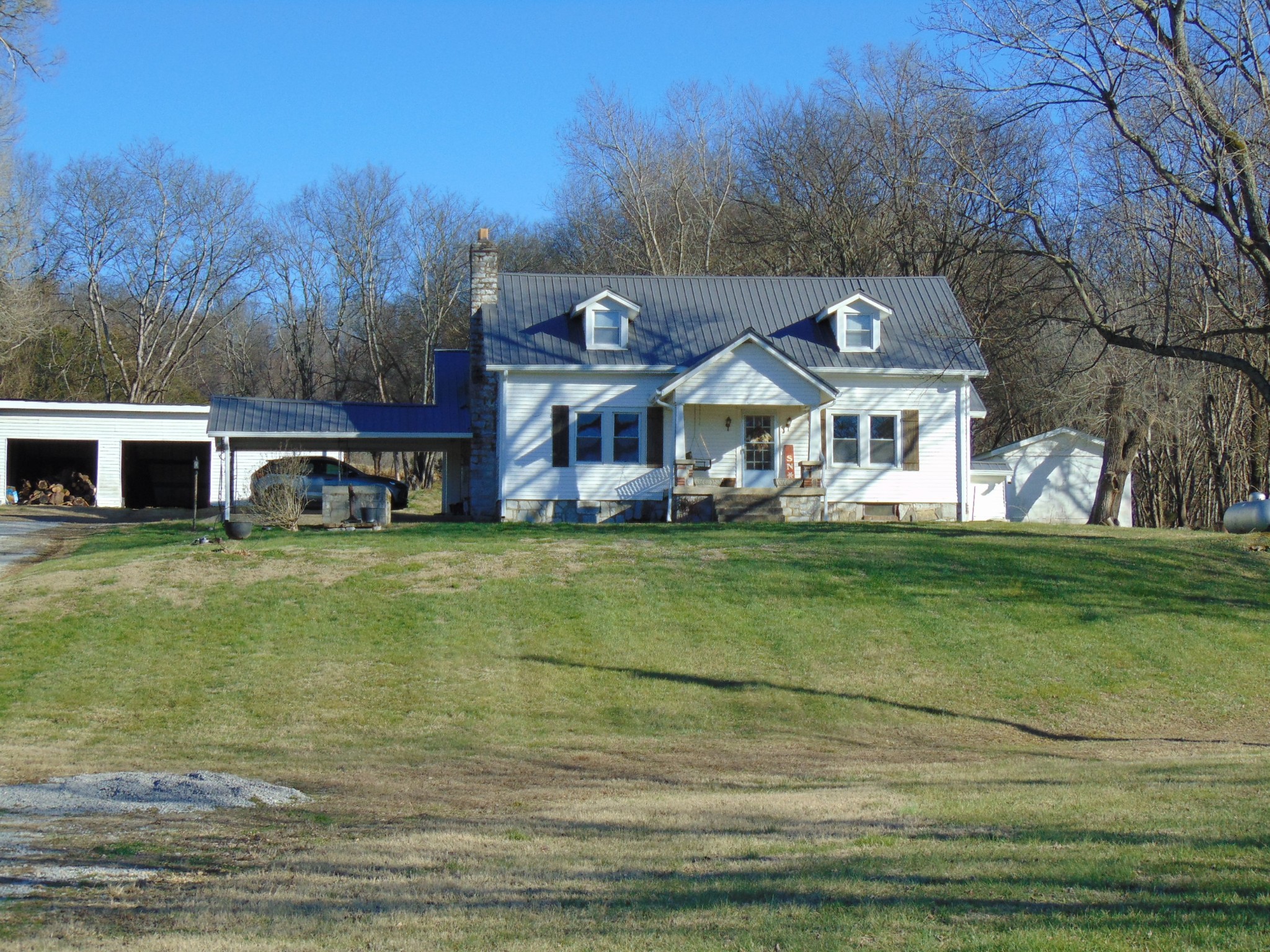 3547 Coffey Branch Road Cornersville, TN 37047 - Photo 56 of 57 a front view of house with yard and trees in the background