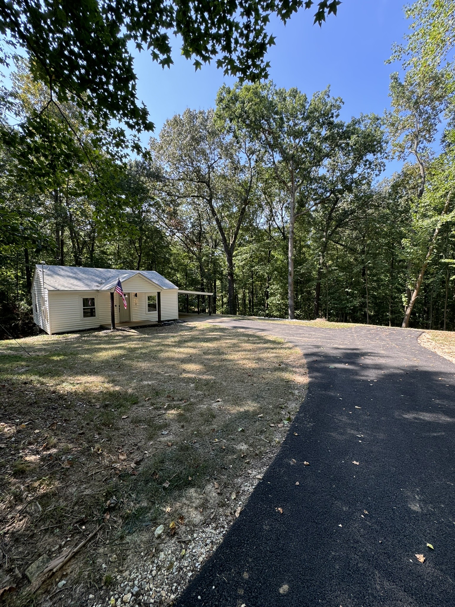 710 3rd Street Paris, TN 38242 - Photo 12 of 34 a front view of a house with a yard