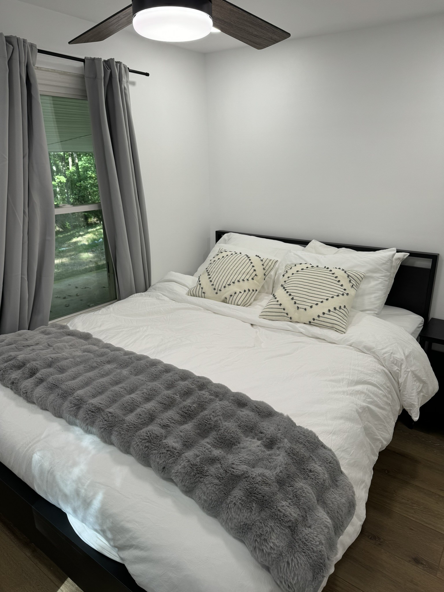 710 3rd Street Paris, TN 38242 - Photo 20 of 34 a bedroom with a bed and a window