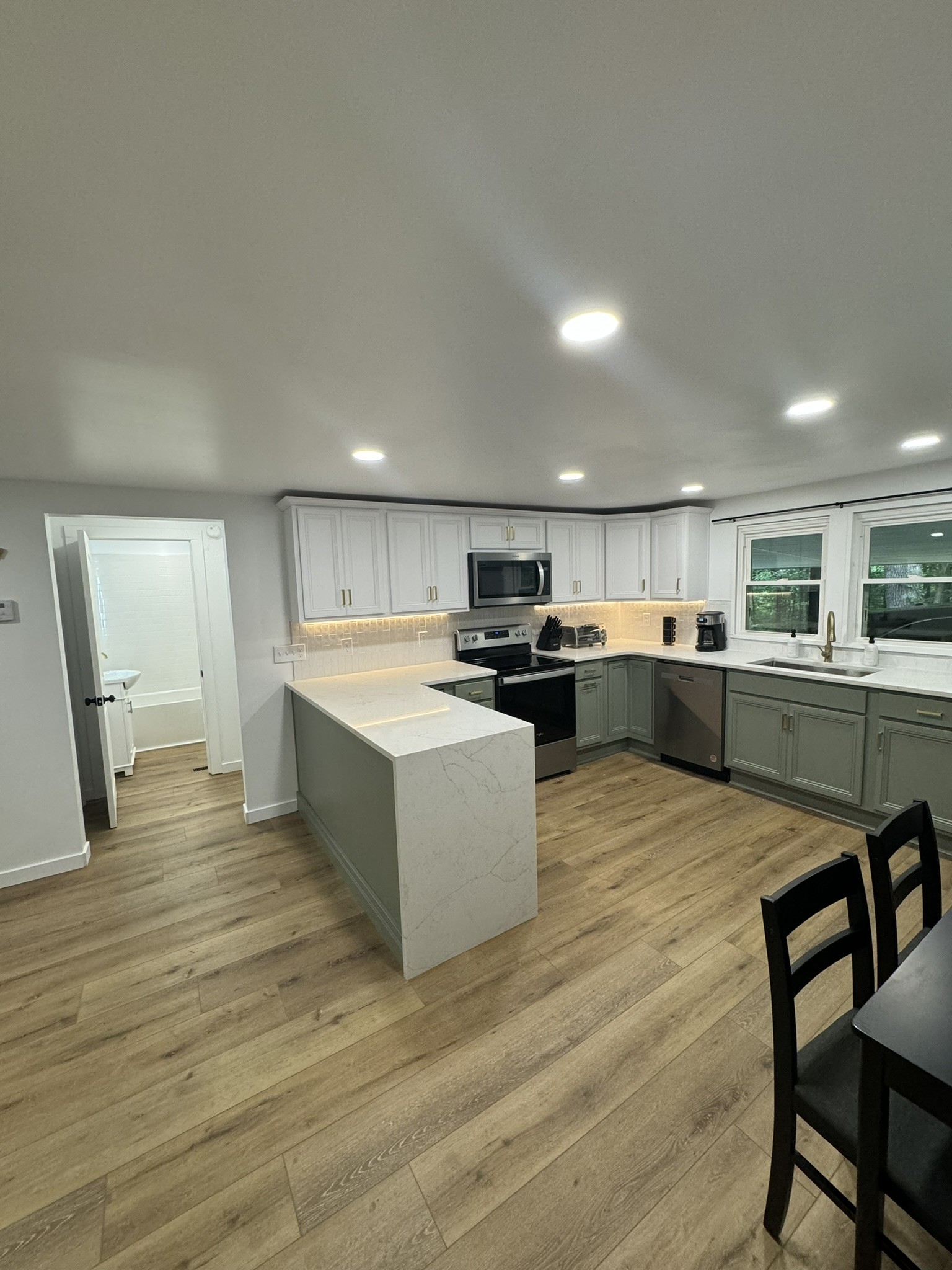 710 3rd Street Paris, TN 38242 - Photo 30 of 34 a large kitchen with a table and chairs