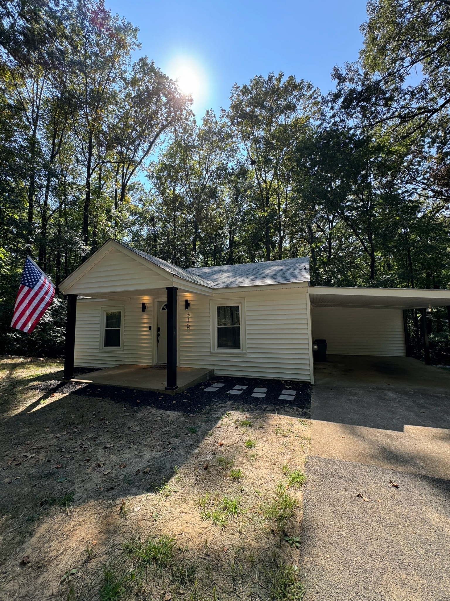 710 3rd Street Paris, TN 38242 - Photo 8 of 34 a front view of a house with a yard