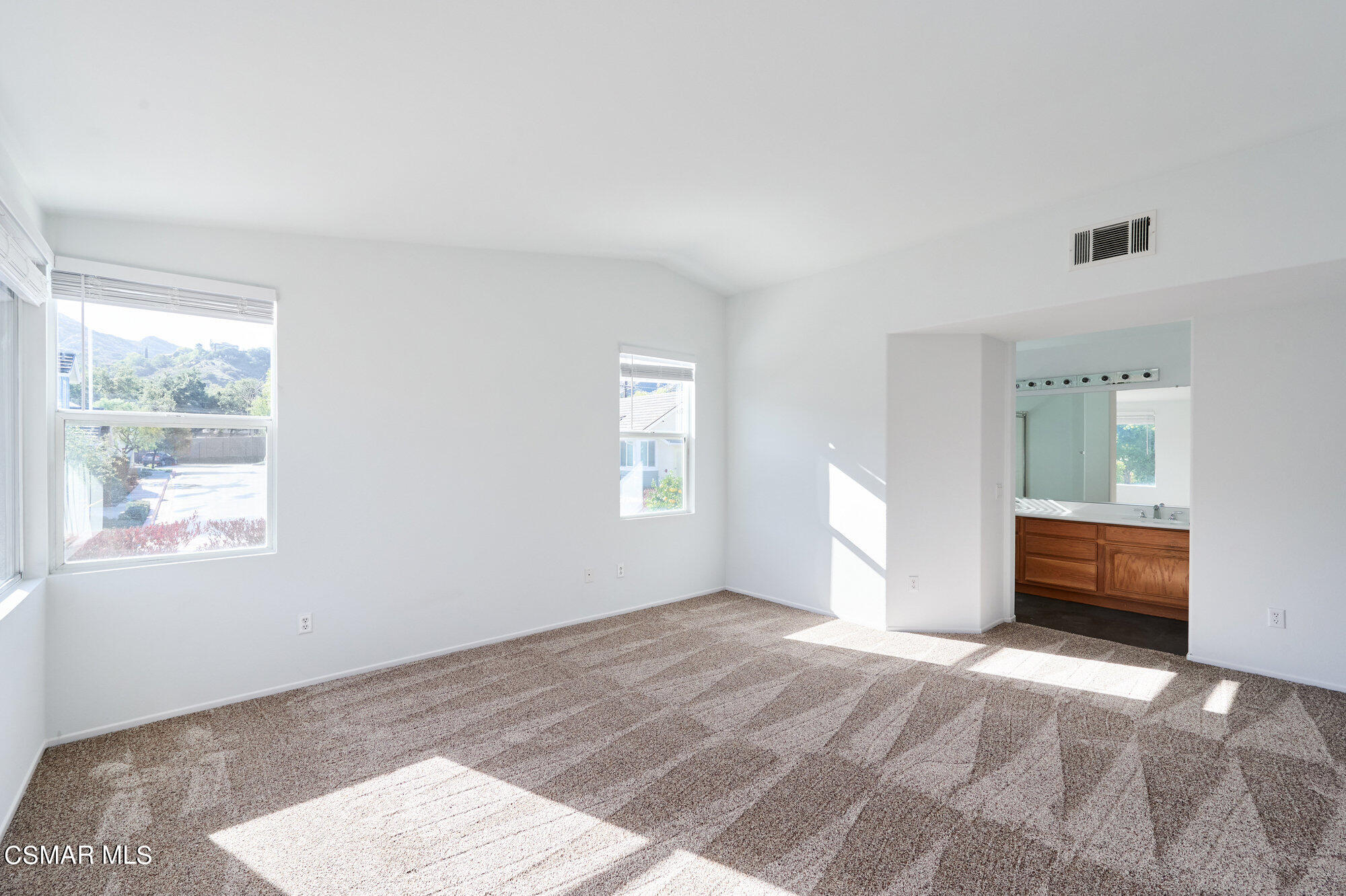 6204 Tangelo Place Simi Valley, CA 93063 - Photo 22 of 41 a view of empty room with wooden floor and fan