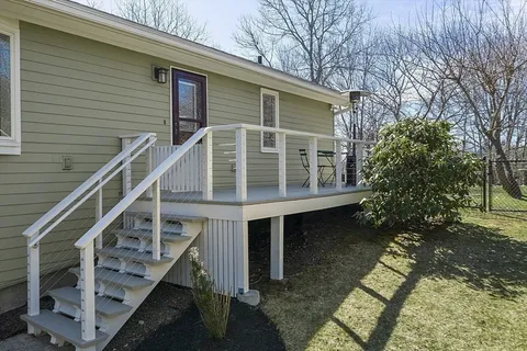 a house with trees in front of it