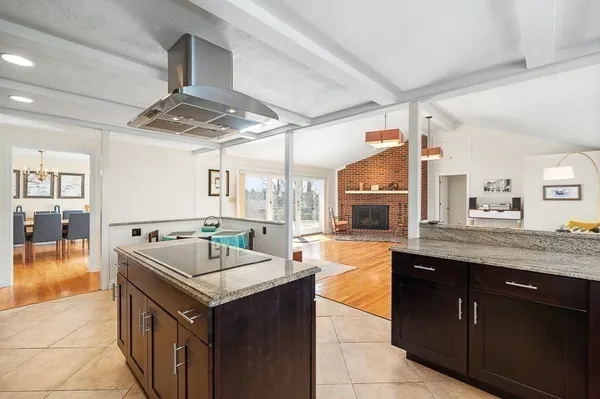 a kitchen with a sink and stove