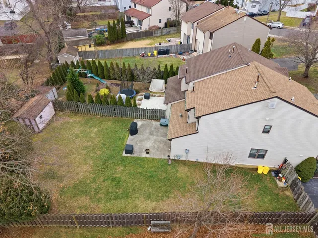 a view of a house with a yard porch and sitting area
