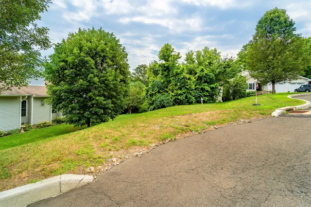 an aerial view of house with yard