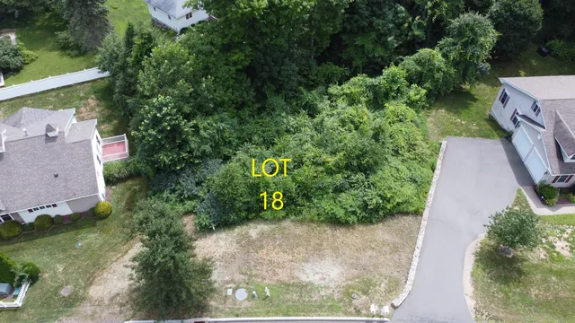 a view of a lake with a big yard