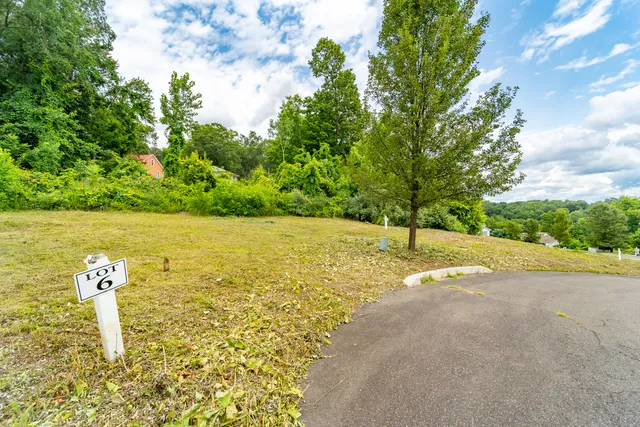 a view of a lake with a house
