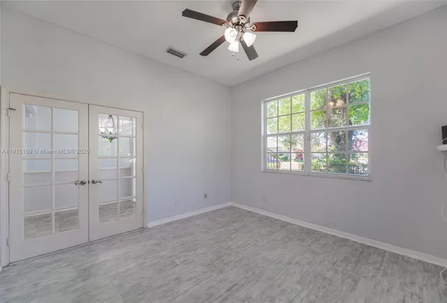 an empty room with windows