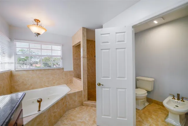 a view of a backyard with swimming pool