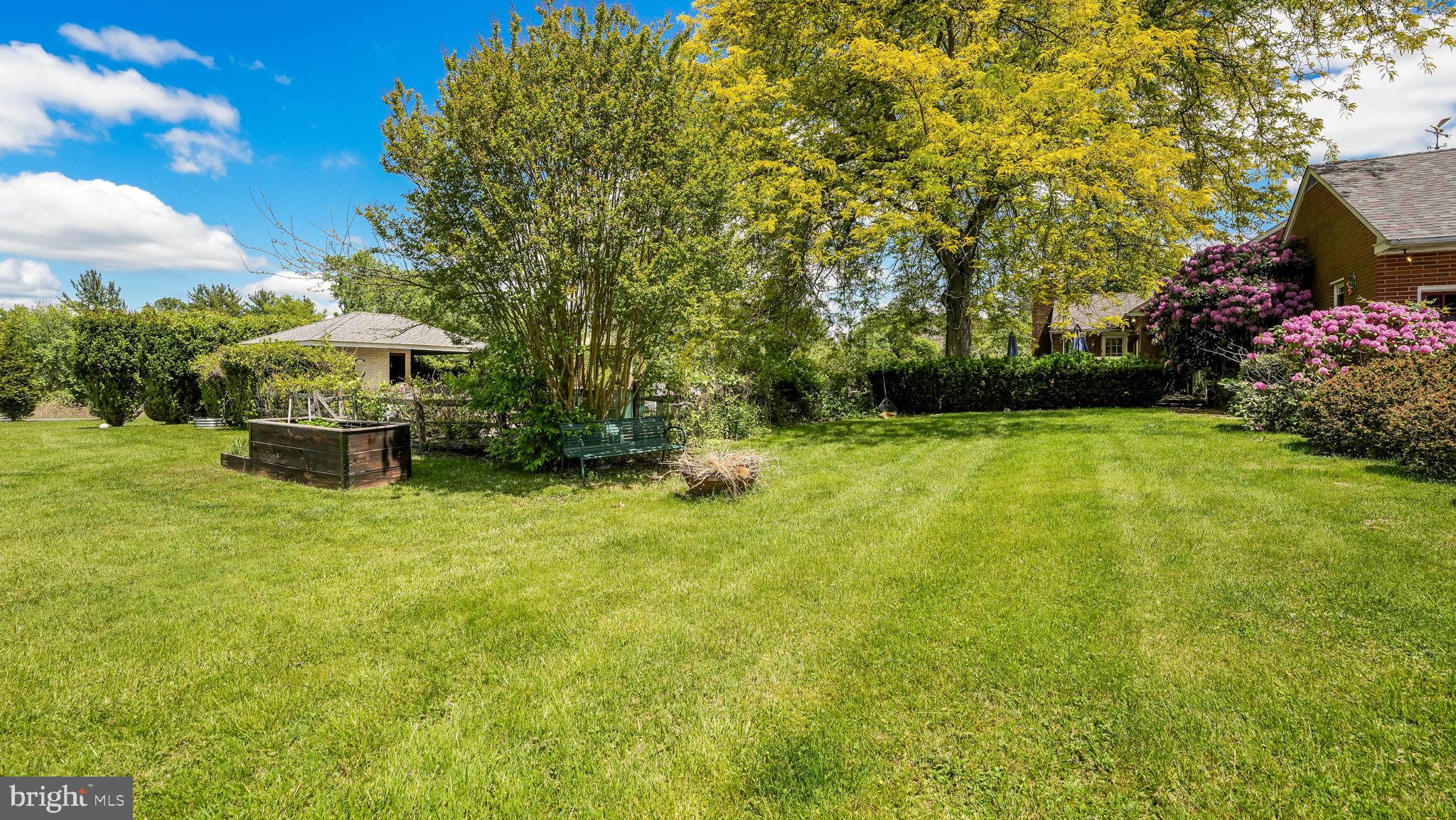 1591 Middletown Road Glen Mills, PA 19342 - Photo 31 of 55 a front view of a house with a yard and trees