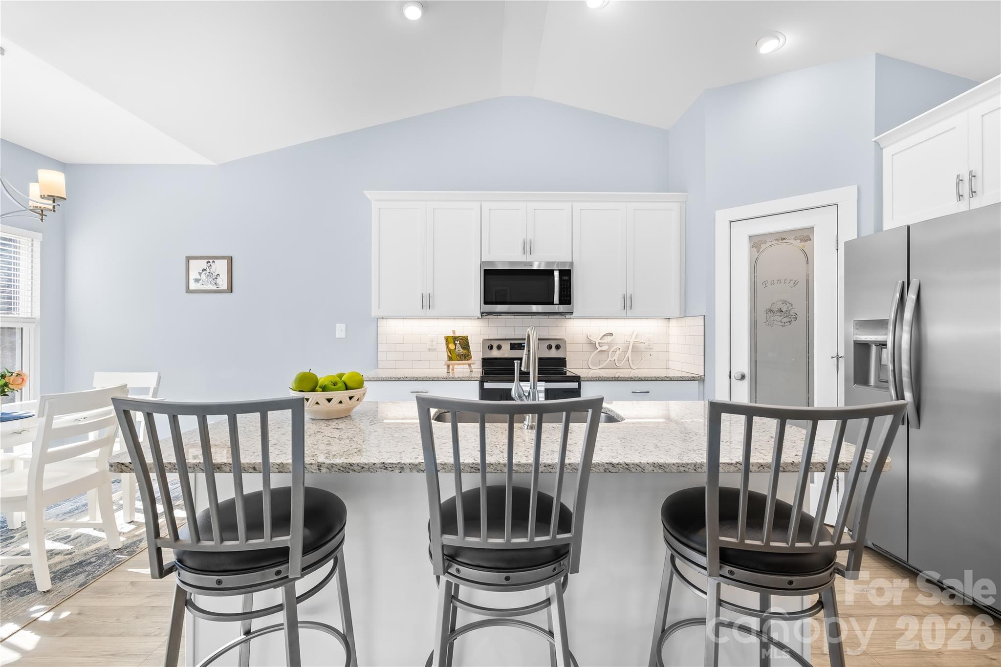 1600 Barefoot Road Catawba, NC 28609 - Photo 11 of 34 a kitchen with stainless steel appliances a dining table chairs and a refrigerator