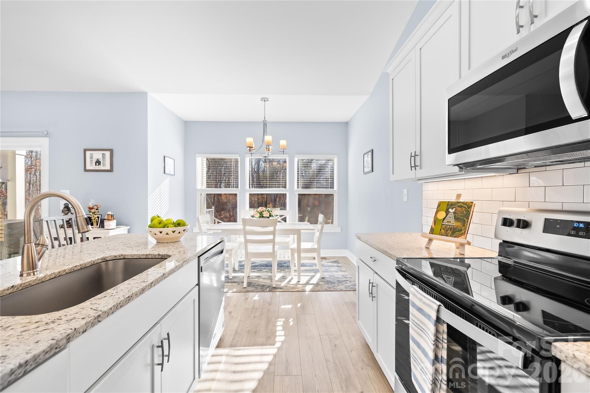 1600 Barefoot Road Catawba, NC 28609 - Photo 14 of 34 a kitchen with stainless steel appliances a stove microwave and sink